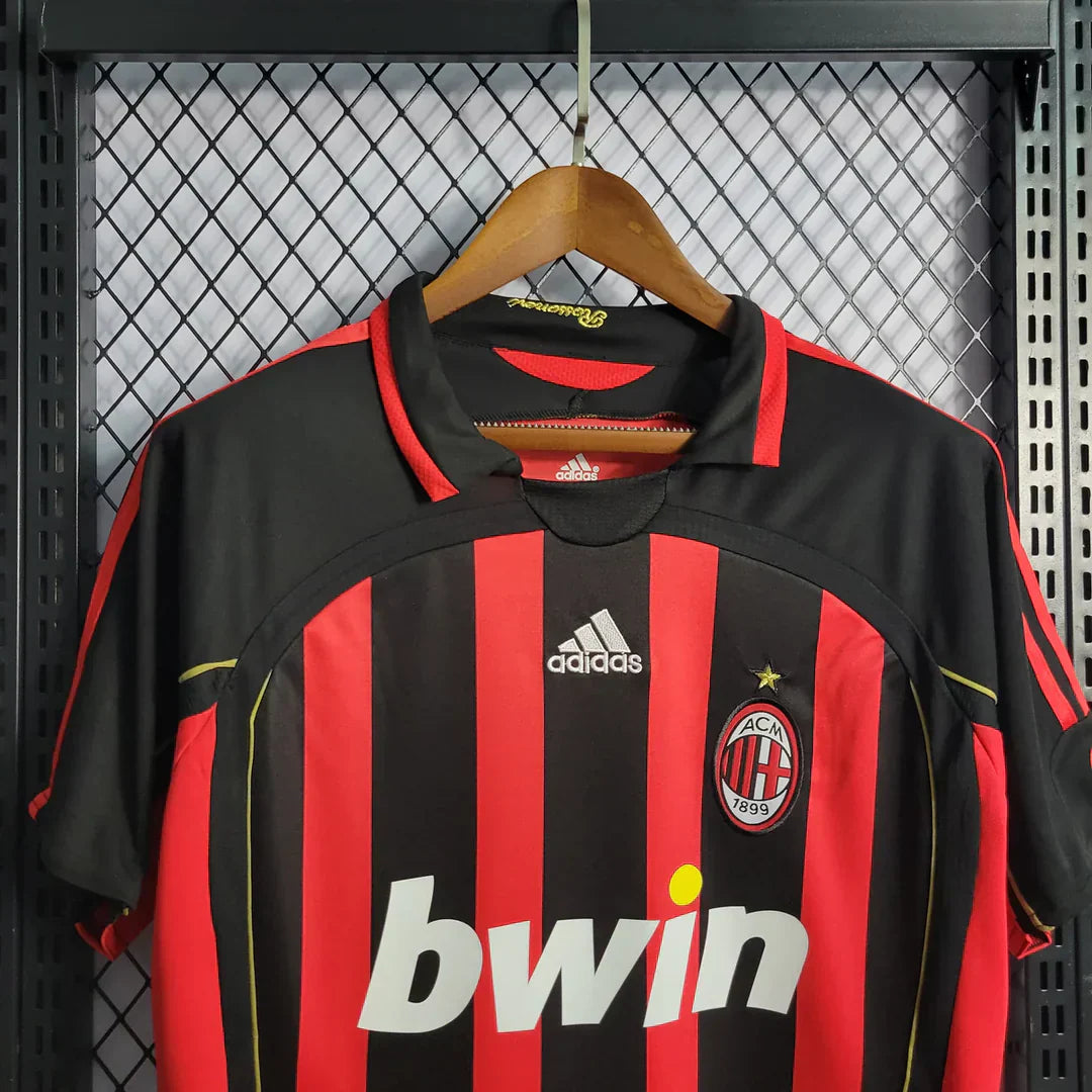 https://cdn.shopify.com/s/files/1/0911/7686/1985/files/ACMILAN2006_07HOMESHIRT3_b3206af3-c495-4e01-9a7f-ba3347f8cffd.webp?v=1731947296